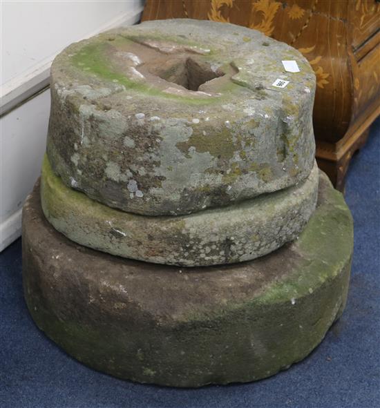 Three mill stones W. 48cm, 48cm and 60cm